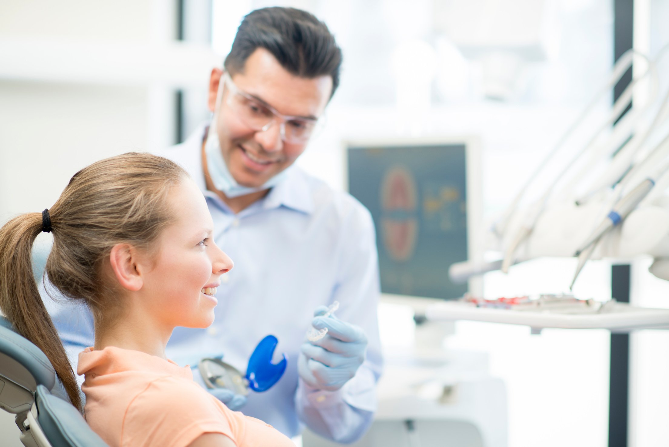 Young Female Teenager getting Invisalign